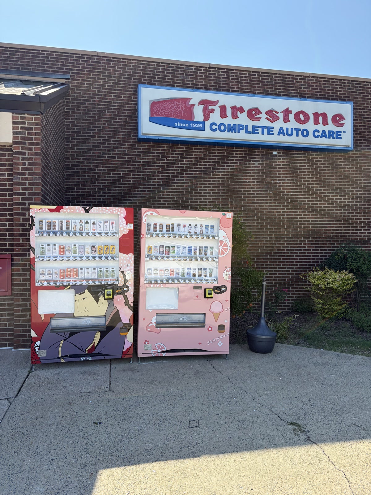 Two Seasons Cafe vending machines outside Firestone Complete Auto Care