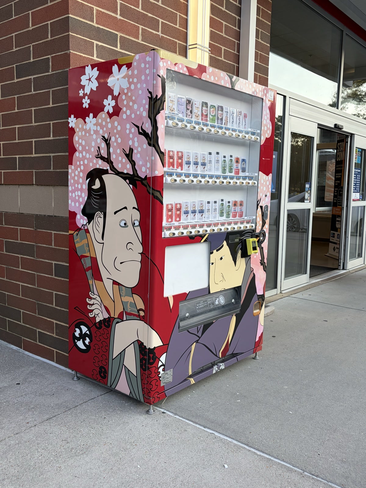 Cherry blossom samurai art wrap on a Seasons Cafe vending machine